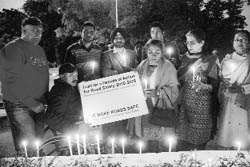 Family members of road accident victims light candles at the roundabout, separating sectors 3 and 4 in Chandigarh on Saturday.