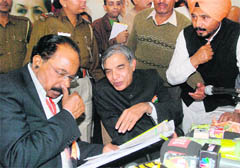Law Minister M.Veerappa Moily interacts with Union Minister Pawan Kumar Bansal at Congress Bhawan in Chandigarh on Saturday. 