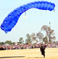 A jawan displays his skills at an Army mela in Bhiwani on Saturday.