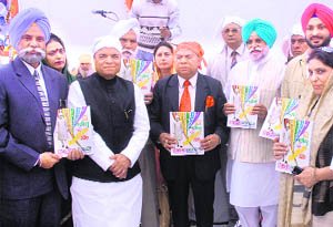 Congress leaders release a magazine on a former minister, Master Gurbanta Singh, on his 31st death anniversary in Jalandhar on Saturday. 