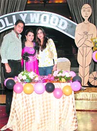 Bikram and his wife (in pink)