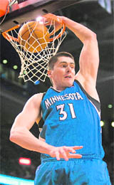 Minnesota Timberwolves forward Darko Milicic dunks against the Toronto Raptors during the NBA game in Toronto  on Friday.