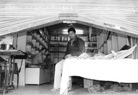 A shopkeeper at his shop where theft took place on Saturday night on the Dera Bassi-Barwala link road