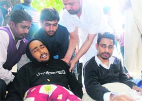 Students belonging to the Panjab University Students Union (PUSU), who were on a hunger strike, being taken to a hospital by the police