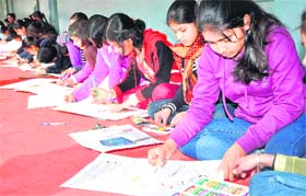 Students take part in a painting competition at Bal Bhawan in Haridwar
