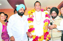 State Congress vice-president Braham Swaroop Brahamchari being felicitated by party workers in Haridwar on Sunday.