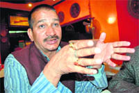 Kishore Upadhyaya, Congress legislator from Tehri, addresses a press conference in Dehradun on Sunday.