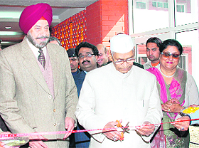 Haryana Governor Jagannath Pahadia inaugurates the International Guest House at Kurukshetra University on Sunday.