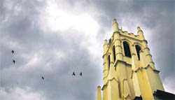 Dark clouds hover over the historical church in Shimla on Sunday. 