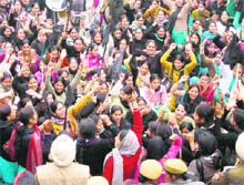 Contract multipurpose health workers (female) hold a protest rally in Amritsar on Sunday. 