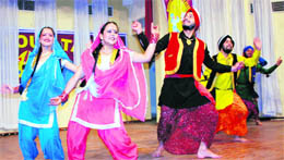 Students give a performance at the Display Your Talent contest at University of Jammu on Sunday.