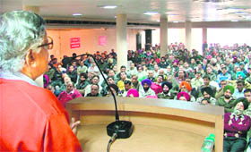 Gurudas Dass Gupta addresses members of the Punjab Bank Employees Federation in Ludhiana on Sunday. 