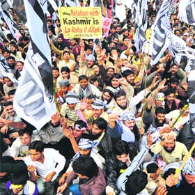 Jamaat-ud-Dawah activists shout slogans at the Kashmir Solidarity Day rally in Lahore