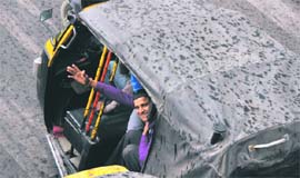 Residents enjoy light showers in Ludhiana on Monday. 