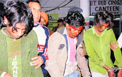 The kidnappers being taken for medical examination to the Government Multi-Speciality Hospital, 