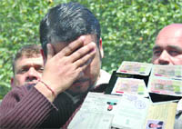 An accused of fake visa racket in New Delhi 