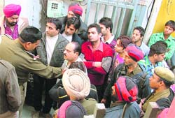 Shopkeepers protest against the installation of a mobile tower at Saaban Bazaar in Ludhiana on Tuesday.