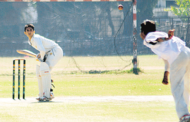 A cricket match in progress between DAV-8 and APJ School in Chandigarh on Wednesday. 