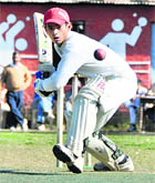A batsman in action during a match in the Junior Boys Council School Cricket Tournament in Dehradun on Wednesday.