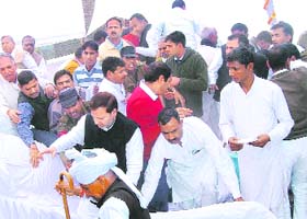 A meeting in Naultha village was thrown into chaos on Wednesday after the stage on which ministers were seated collapsed