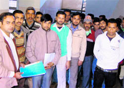 Members of the Lok Mitra Kendra at the DC office in Dharamsala on Wednesday