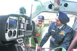 Wing Commander Akhilesh Chauhan briefs Air Vice-Marshal PS Gill, Air Officer Commanding, J&K, at the Udhampur Airbase