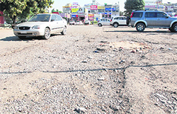 A parking lot in a state of disrepair in Phase III B2 in Mohali.