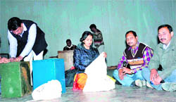Election in charges give training to government employees at a convention at BHEL in Haridwar