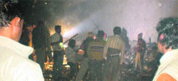 A rescue operation in progress to save the buried labourers.