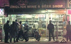 Liquor vend near Ajanta Travel Agency  12.30 am  