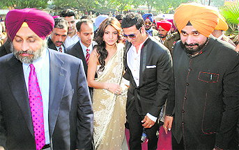 Deputy CM Sukhbir Singh Badal, Anushka Sharma, Akshay Kumar and BJP leader Navjot Singh Sidhu at the premiere of a film in Patiala on Thursday. 