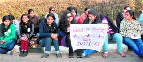 Students of University Business School stage a dharna in front of the Vice-Chancellors office at Panjab University in Chandigarh on Friday.