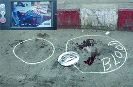 The spot where a girls body was found in a bag (inset) at New Delhi Railway Station on Friday. Tribune photo
