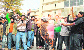 Members of the Progressive Students Association stage a protest in Jammu