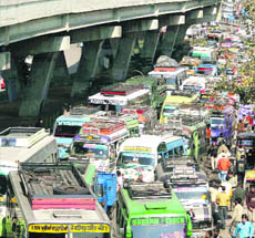 A road jampacked with mini-buses in Jammu.