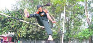 A student takes part in the high jump event at Guru Nanak Girls College, Ludhiana, on Friday.