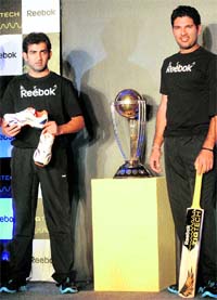 Gautam Gambhir and (R) Yuvraj Singh at a promotional event ahead of the World Cup in New Delhi.
