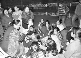 A UBS faculty member tries to persuade girl students to give up their protest
