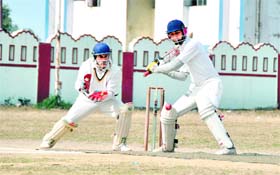 A match in progress at the 60th District Cricket League in Dehradun