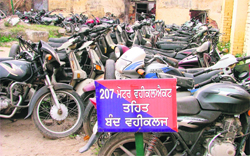 Unclaimed vehicles impounded under the Motor Vehicles Act parked at the Kotwali Police Station in Ludhiana.