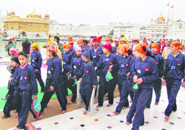 Children from Kashmir, on a tour under the Armys Sadbhavna Yatra programme, at the Golden Temple 
