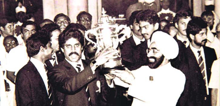 CUP OF CHEER: Winning captain Kapil Dev and then President Giani Zail Singh hold the 1983 World Cup