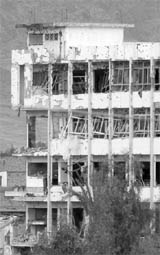 The partly damaged building where the Afghanistan police exchanged gunfire with the Taliban in Kandahar on Saturday.