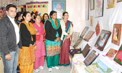Educationists have a look at the art exhibition in DAV College of Education, Abohar. 