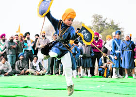 A young boy plays gatka during a competition held on Sahibzada Ajit Singh’s birth anniversary in Phase VIII, Mohali.