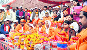 Pakistani residents with 135 urns carrying the ashes of their relatives in Haridwar on Sunday.