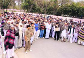 Villagers from Chandrawal and neighbouring villages outside the SPs residence at Fatehabad