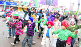 Young fans of Team India take out a procession in Jammu on Sunday.