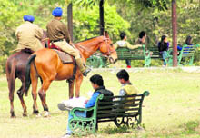 Police personnel keep vigil at the Leisure Valley in Sector 10, Chandigarh, on Valentines Day on Monday. 