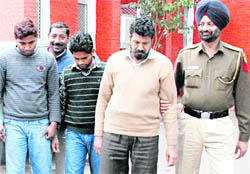 The accused in police custody in Chandigarh on Monday.